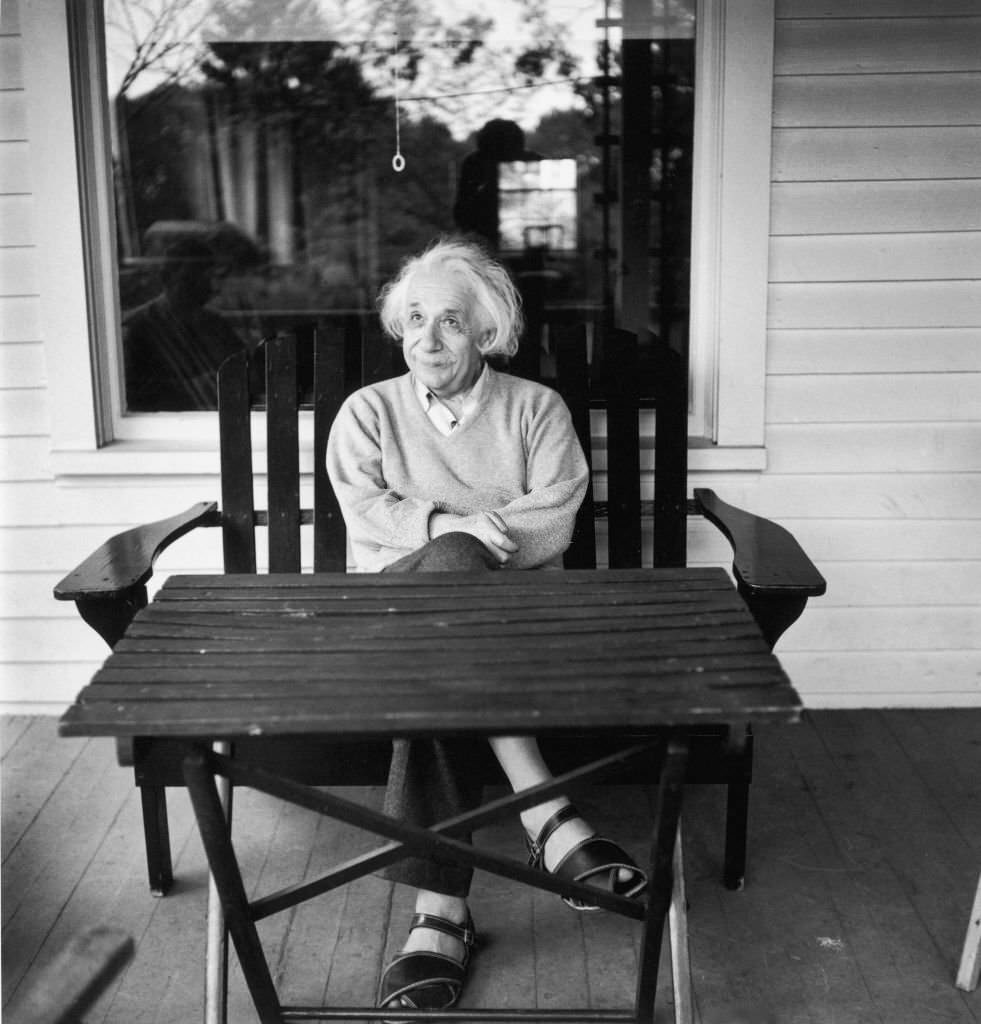#82 Albert Einstein outside his home at Princeton, New Jersey, 1951