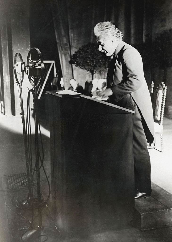 #57 Albert Einstein giving a lecture at the 1930 Solvay Congress in Brussels