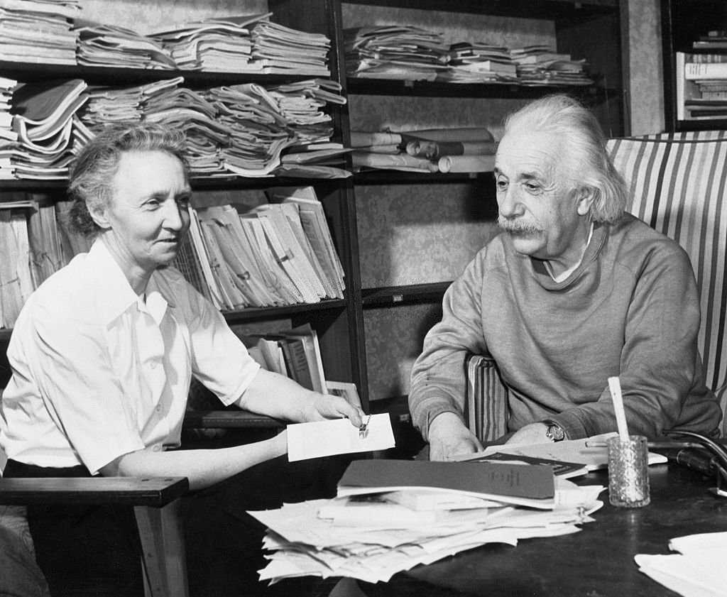 #35 Albert Einstein (right) and Madame Irene Joliot Curie, French nuclear physicist, talk informally in the study of Einstein’s home in Princeton, N.J.