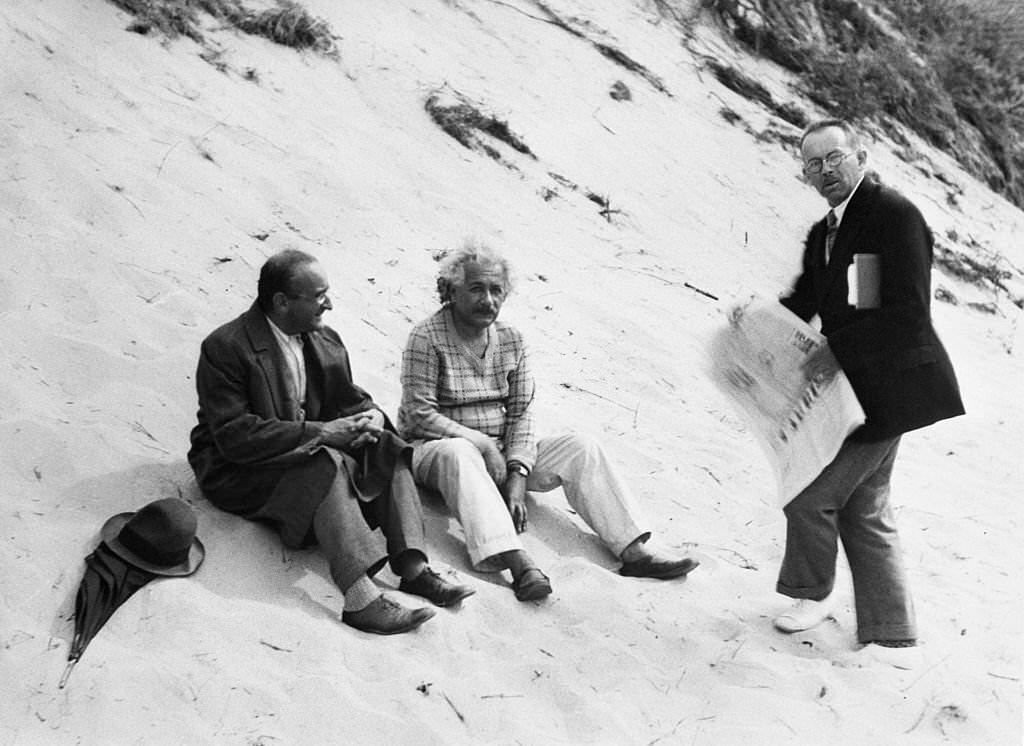#38 Albert Einstein with Hans Meyer on the sand dunes at Coq-Sur-Mer, Belgium, where the world renowned scientist took refuge from Nazi threats.