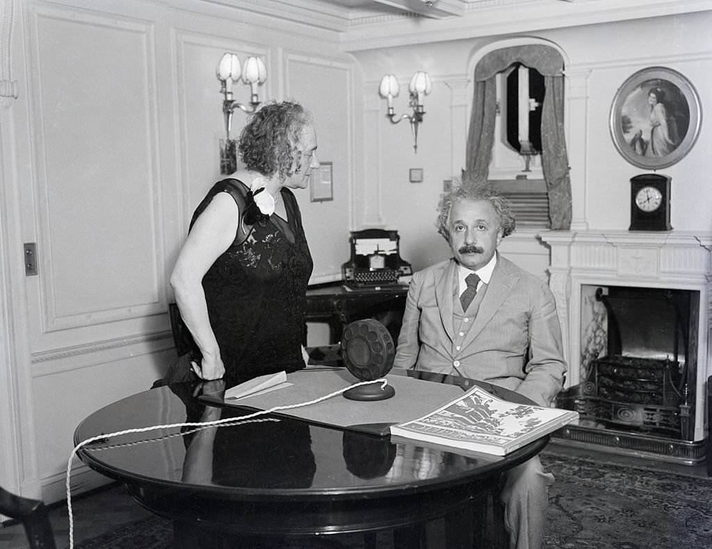 #97 Albert Einstein with his wife Elsa Einstein, 1932