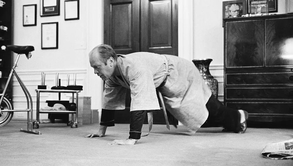 #13 Gerald Ford does push-ups in the White House, 1975.