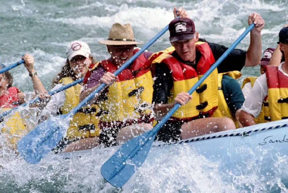#17 Bill Clinton enjoys some whitewater rafting on the Snake River in Wyoming, 1995.