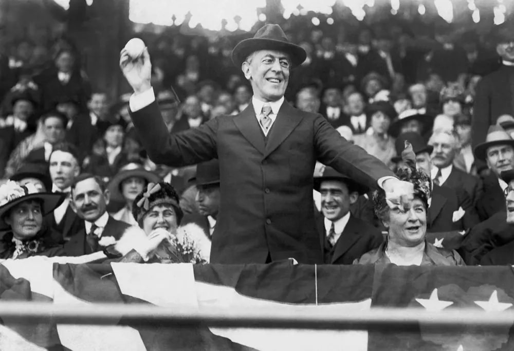 #3 Woodrow Wilson throws out the first ball of the baseball season in Washington, D.C., 1916.
