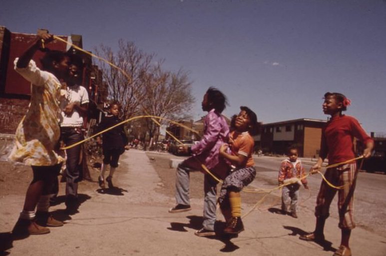 #5 Children play outside the Ida B. Wells Homes, one of Chicago’s oldest housing projects. There are 1,652 apartments housing 5,920 persons in 124 buildings on the South Side.