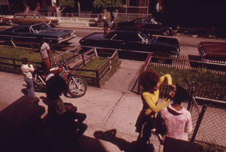 #6 Black neighbors outside on Chicago’s West Side. They are part of the nearly 1.2 million people of their race who make up more than one-third of Chicago’s population.