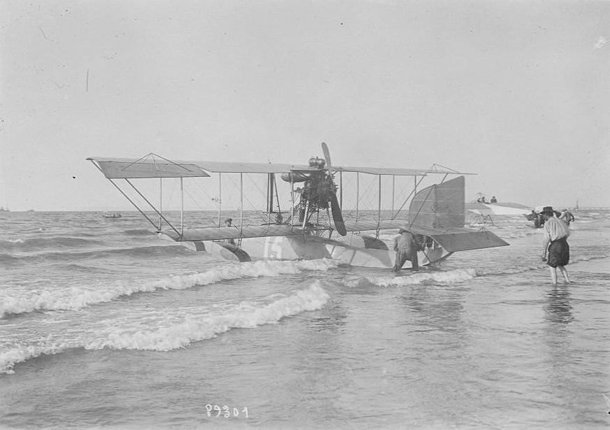 #37 At a beach in Deauville-les-Bains, Henri Molla takes off in a Leveque Type II floatplane during the Concours des Avions Marines. Molla won the speed competition over a distance of 250 nautical miles, 1920s