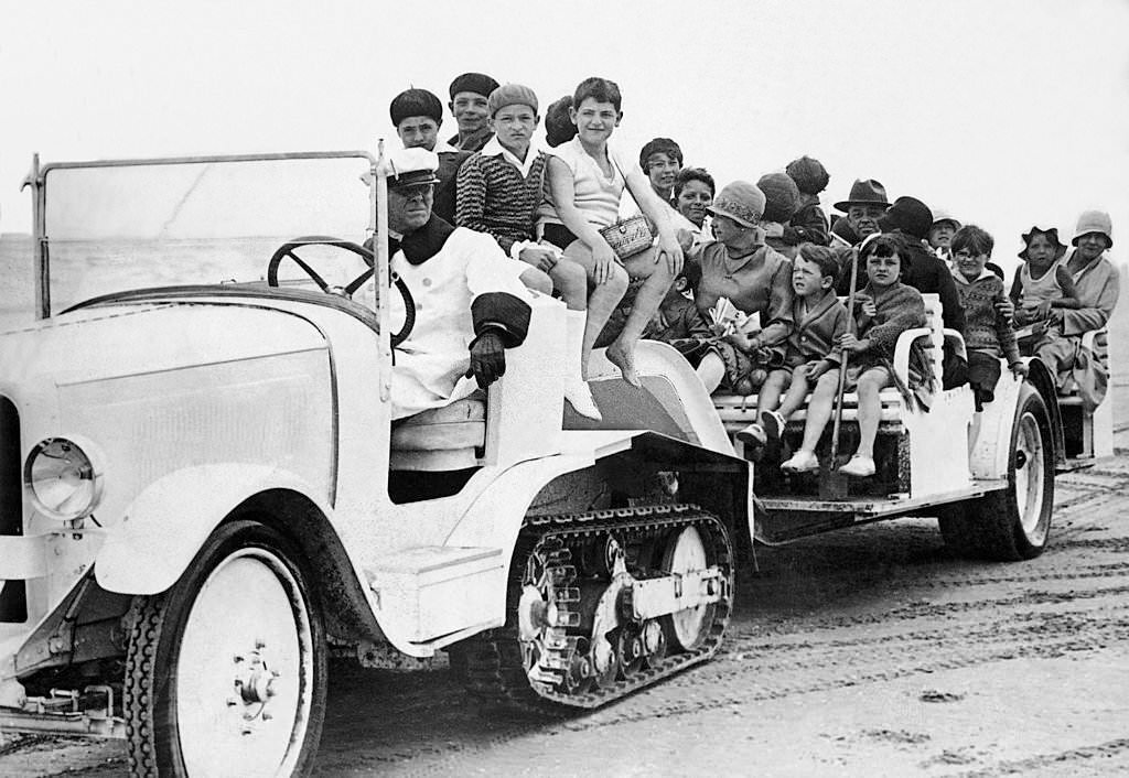 #4 Families in tracked Vehicles on Deauville Beach, 1925.