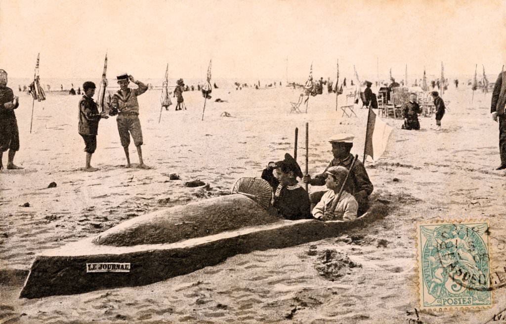 #50 The many pleasures available on a beach, including building a sand boat, at Deauville, 1909
