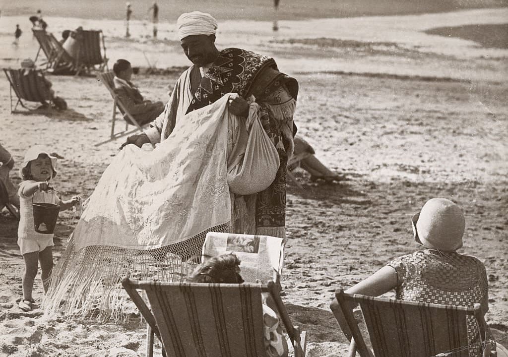 #55 Carpet dealer on the beach of Deauville (Calvados, France), 1930