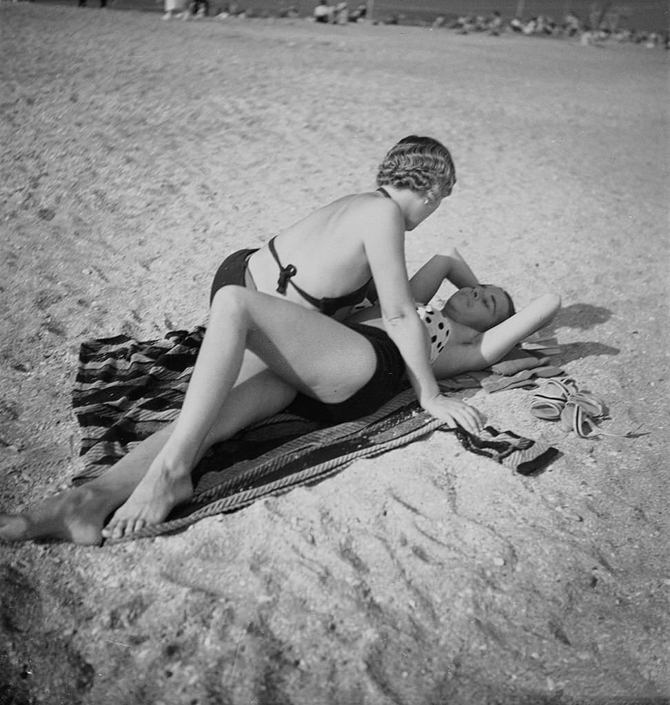 #72 Women on the beach of Deauville, 1936
