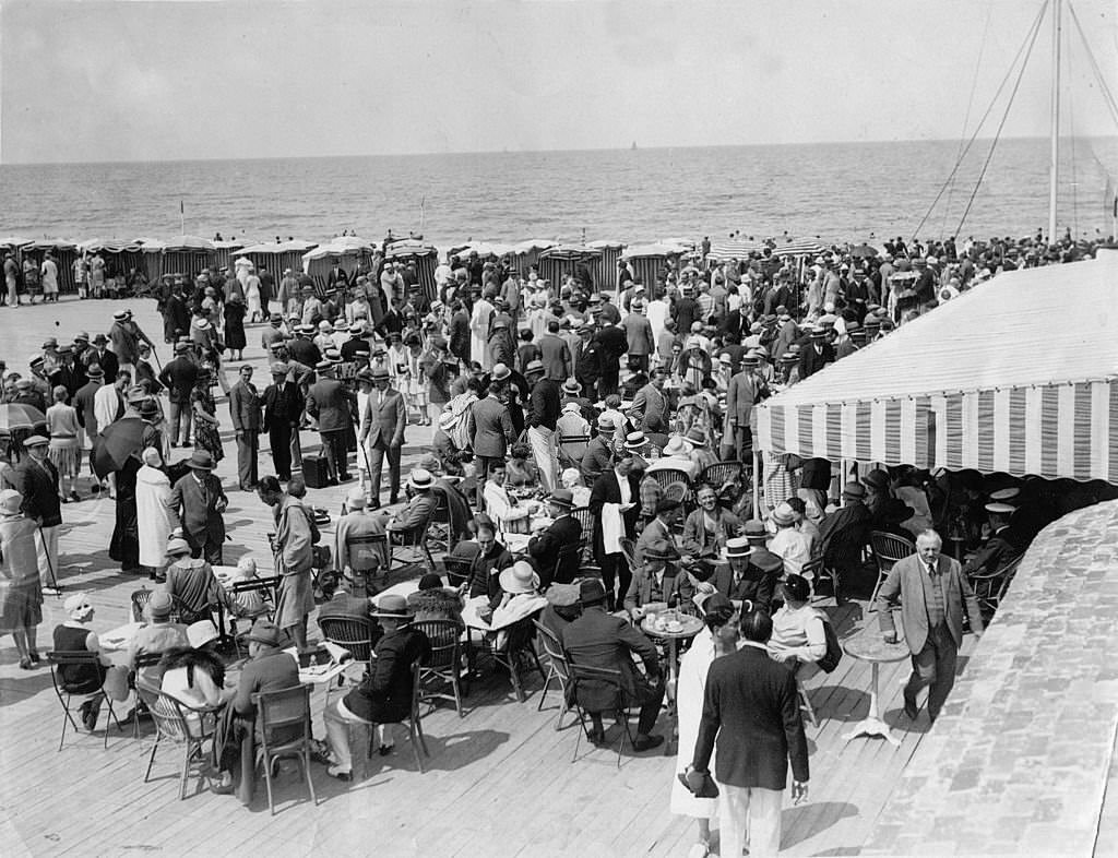 #93 Masses of people at the beach of Deauville, 1930