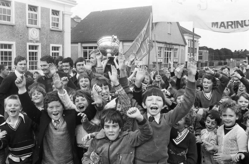 #20 The Sam Maguire at Marino school following the Dublin team’s success against Kerry in the 1976 All Ireland Final.