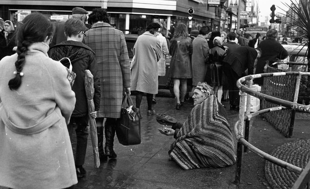 #75 Native Musician Busking on O’Connell Street where Nelson’s Pillar used to be, 1971