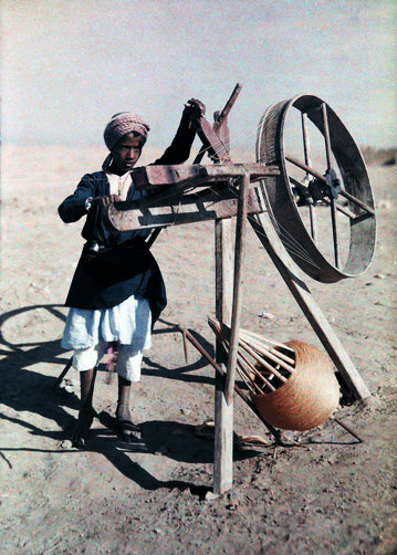 #1 Boy reels silk in a desert near Cairo.
