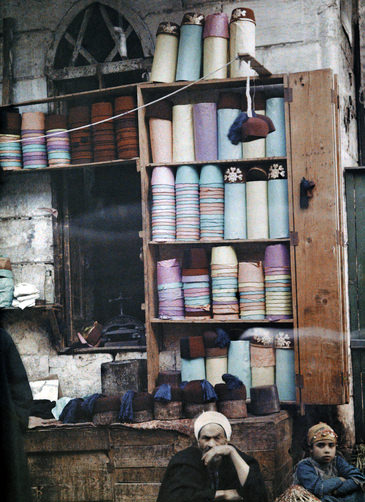#33 Egyptian street merchant sells hats.