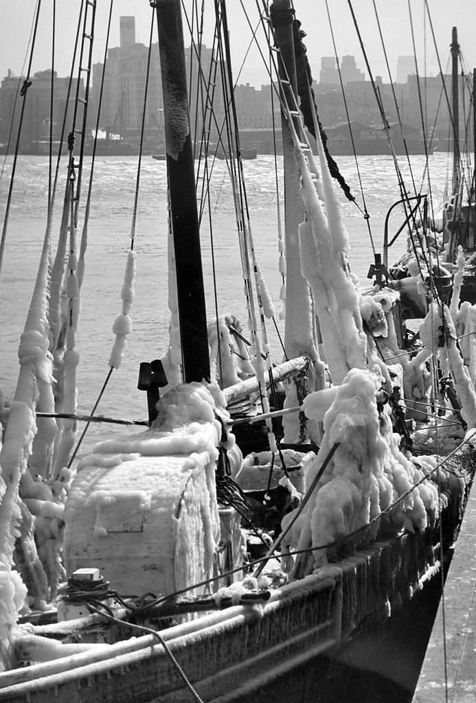 #100 Iced up fishing vessels berthed at Fulton Street fish market, 1940s