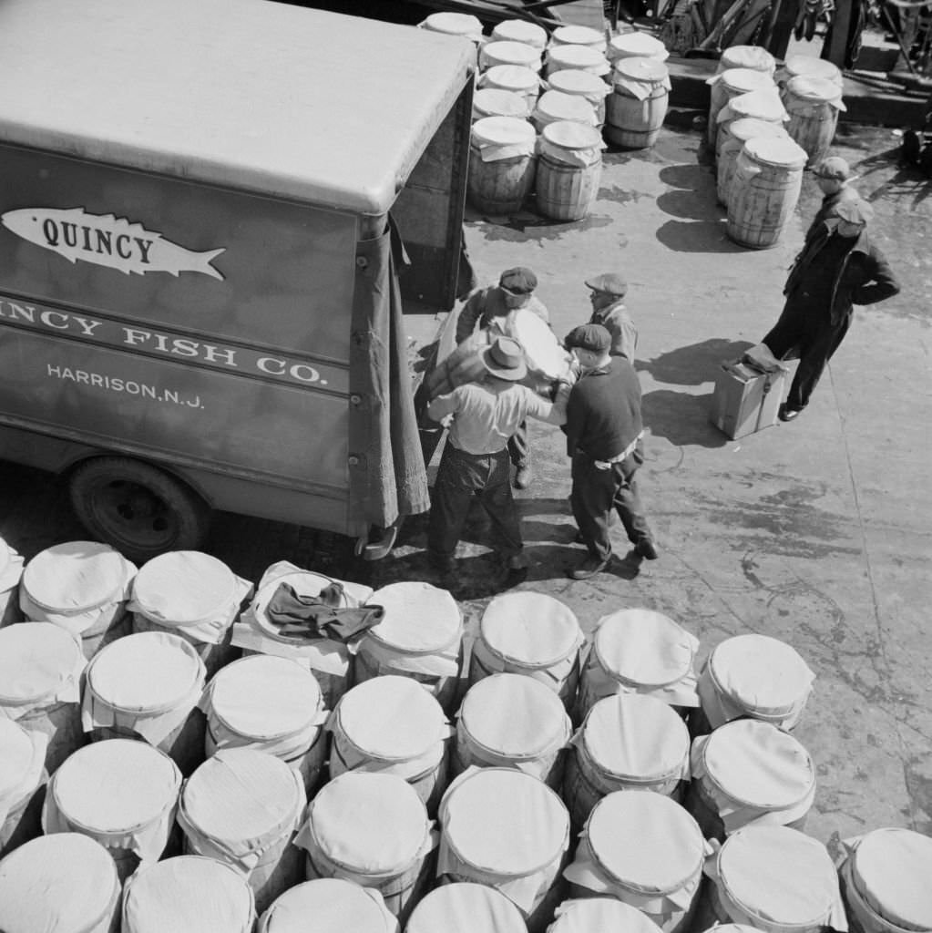#149 Barrels of fish on the docks at Fulton fish market ready to be shipped to retailers.