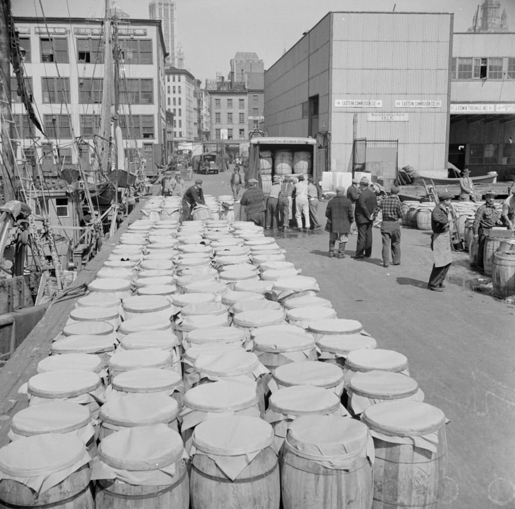 #151 Barrels of fish on the docks at Fulton fish market ready to be shipped to retailers.