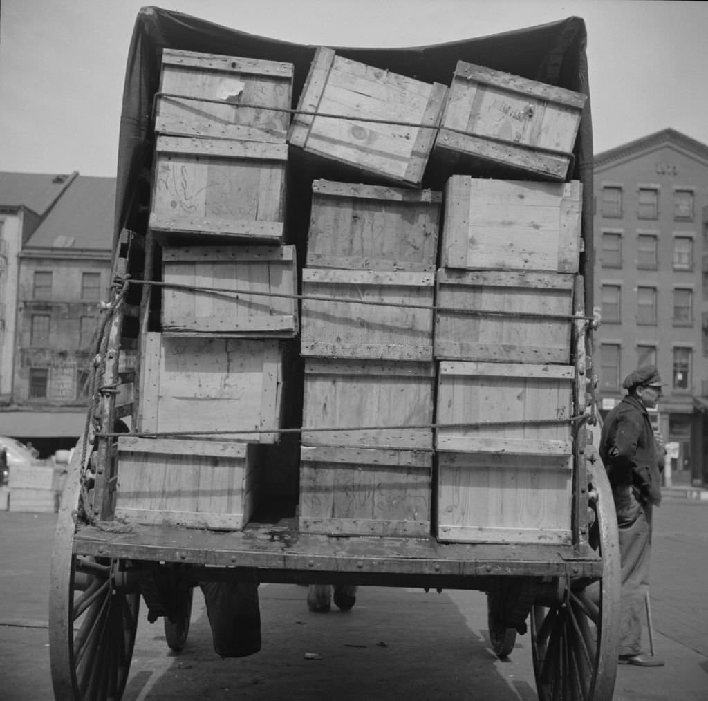 #34 Shipping fish by horse-drawn vehicle from Fulton fish market, 1937