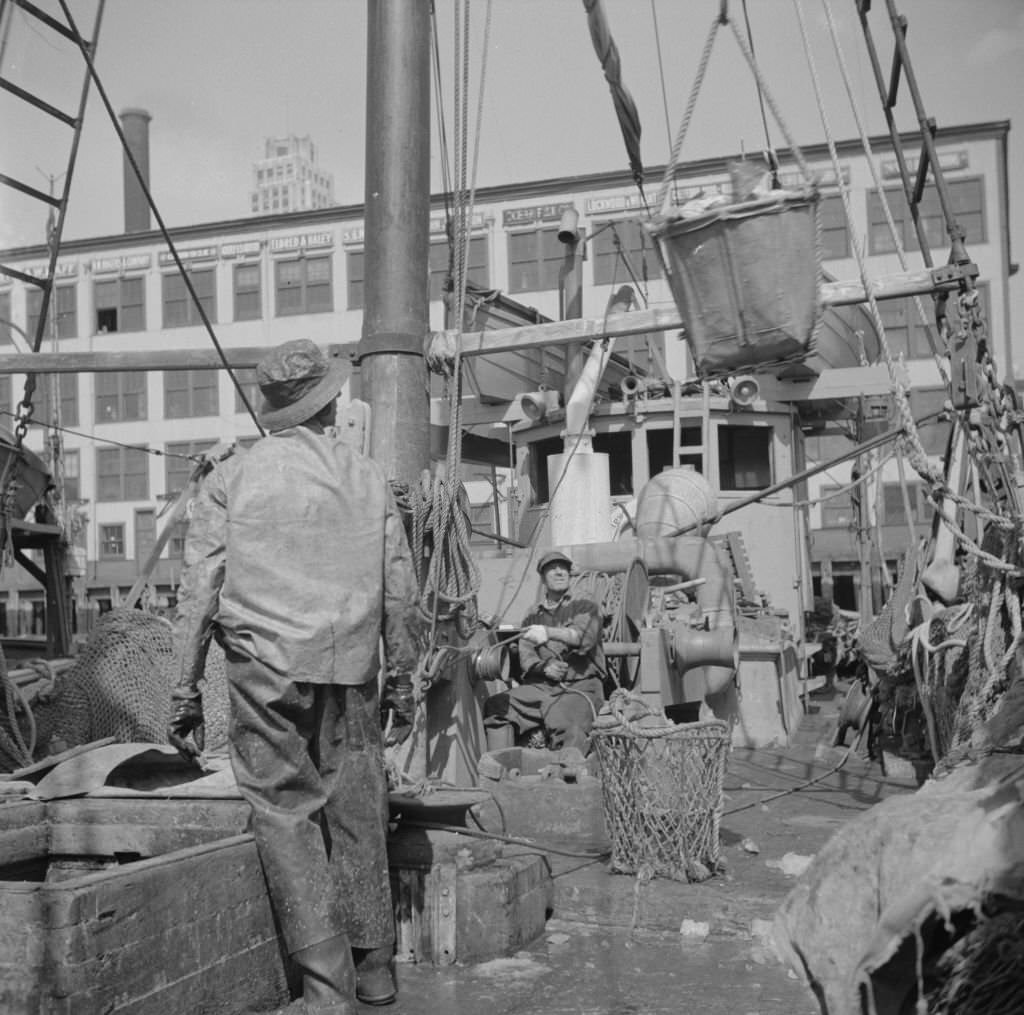 #2 A hoister unloading fish at the Fulton fish market, 1934