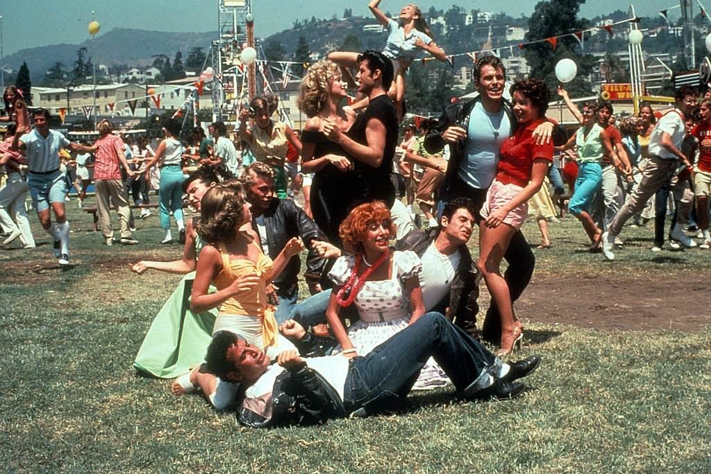 Olivia Newton John, John Travolta and the rest of the gang in a scene from the film ‘Grease’, 1978.