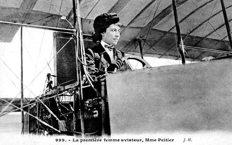 #5 A vintage postcard showing Therese Peltier, the first woman to pilot a heavier-than-air craft, in Turin, 1908.