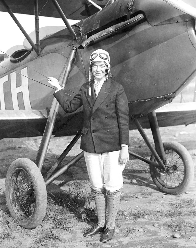 #8 “Elinor Smith, 16, who will use the Waco plane beside which she is standing in an attempt to set a new altitude record for women, 1927