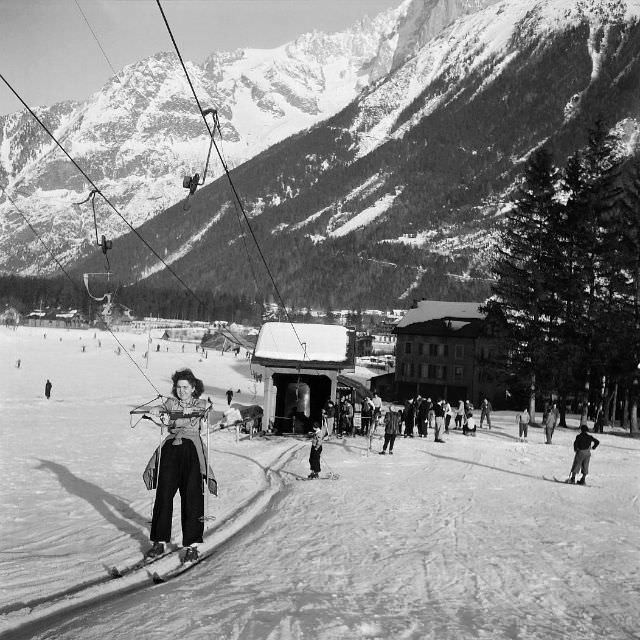 #11 People enjoy skiing during the winter holidays in Chamonix, France, February 1947.