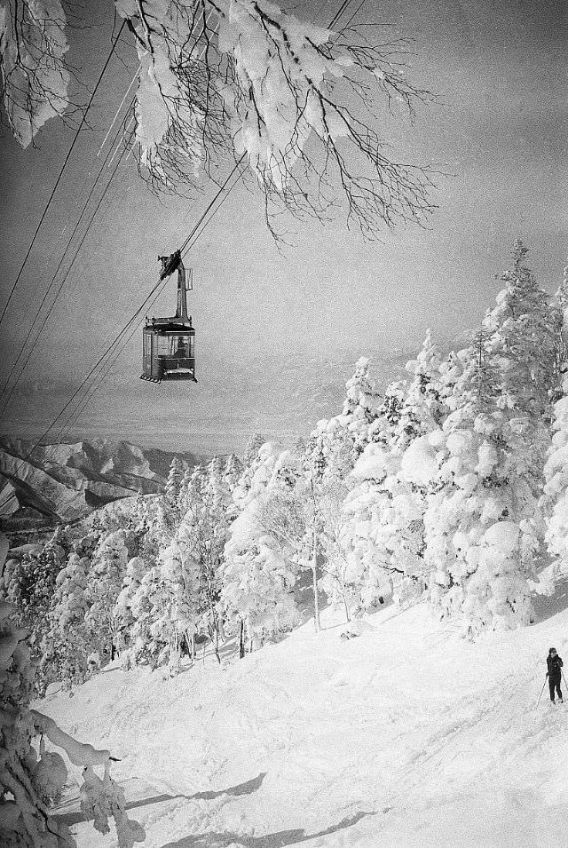 #22 Ski lifts above a snowy scene near Shiga Kogen ski resort in Yamanouchi, Nagano, Japan, February 1961.