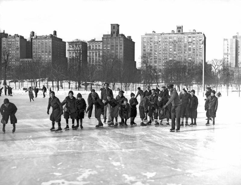 #37 Ice skaters in a race, 1933.
