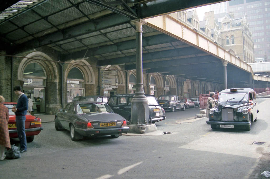 #30 Liverpool St Station taxi ramp, 1987. MacDonald’s are in the replica of the building that you can see in the right hand corner of this Photo