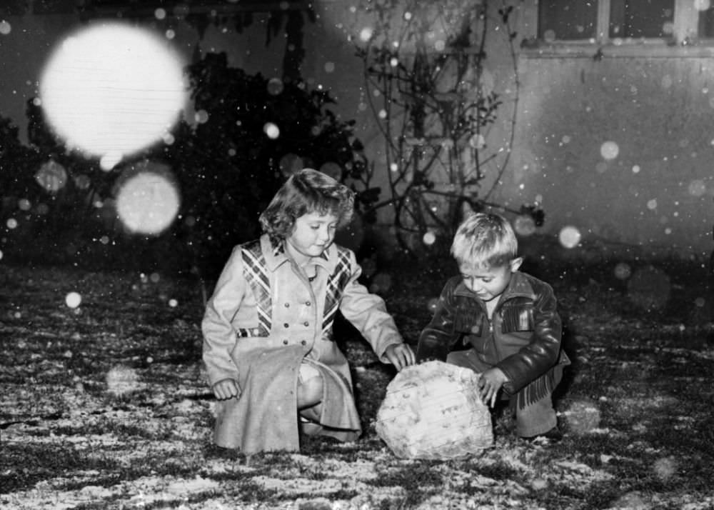 #1 Patricia and James Perkins of Riverside, like most members of a new generation, see snow for the first time.