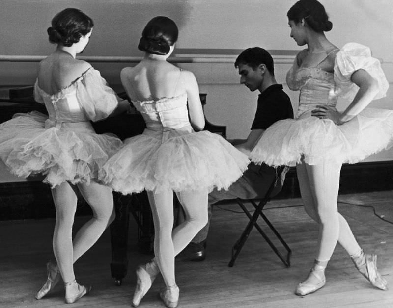 #4 Ballerinas at George Balanchine’s American School of Ballet gathered around accompanist during rehearsal, 1936.