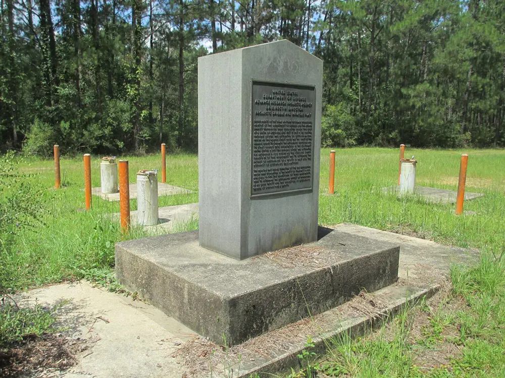 #24 A granite monument surrounded by test wells marks the site of the nuclear bomb tests in southern Mississippi.