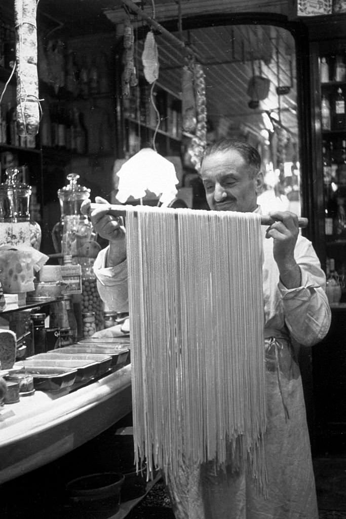 #48 Eugenio Celoria making tagliatelli in his shop, King Bomba’s, in Soho, 1939