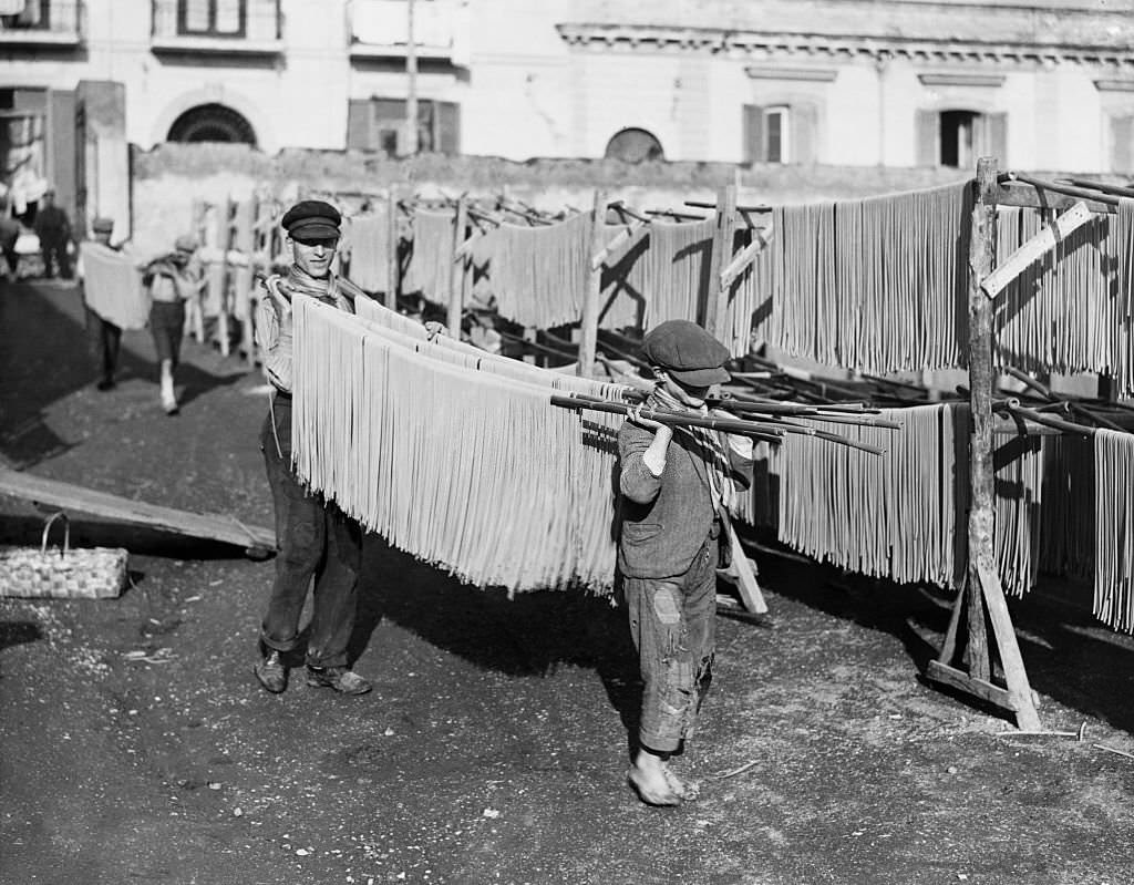 #51 Young Men and Boys Drying Macaroni