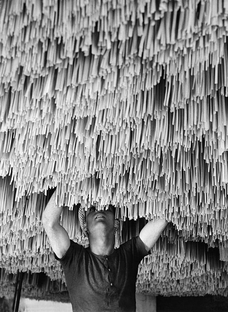 #67 Spaghetti production Drying and hanging up spaghetti in Italy, 1932