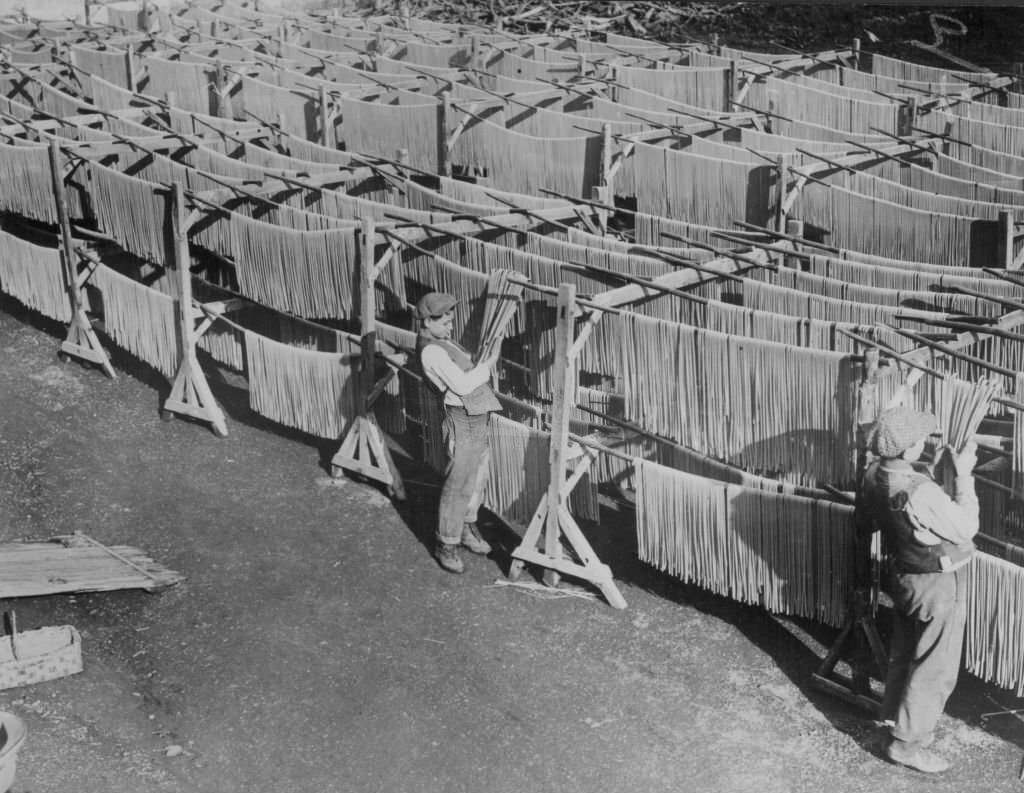 #1 Italian boys hanging hand-made pasta in the traditional way, Italy, 1920s