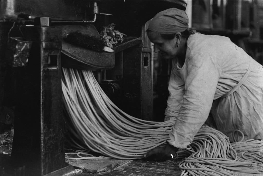 #74 A worker making macaroni in Russia, 1923