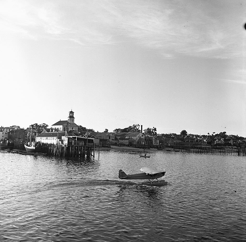 #106 A seaplane lands on the water, Provincetown, Massachusetts, 1948.