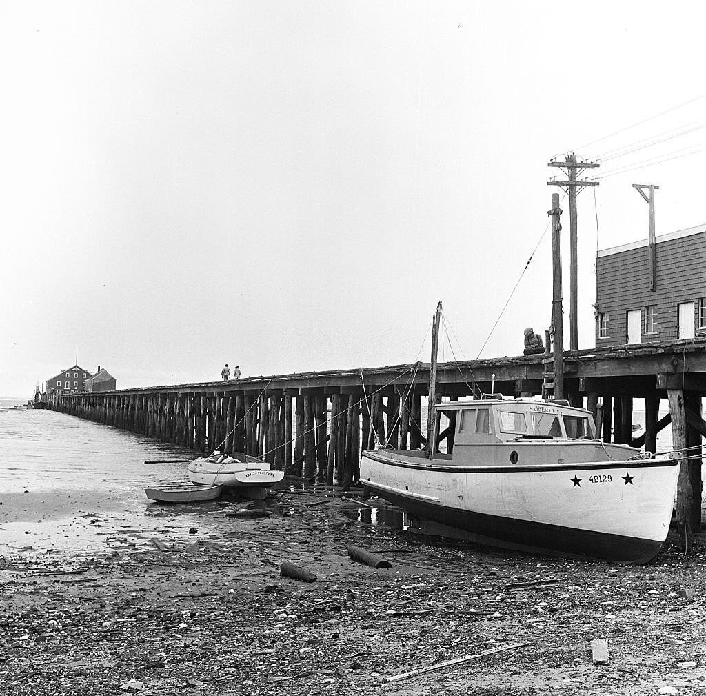 #124 View of boats docked along the pier, Provincetown, Massachusetts, 1948.