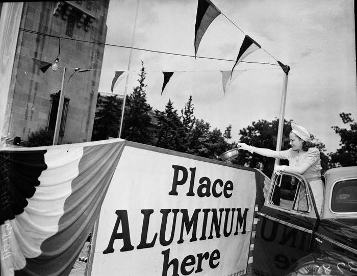 #128 Daisy Mathews donates to scrap aluminum drive, 1941