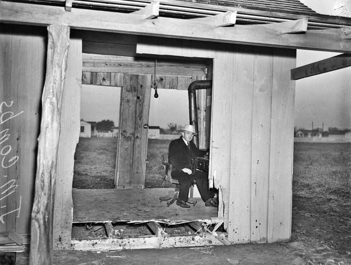 #146 Aftermath of automobile driving through small office, 1941