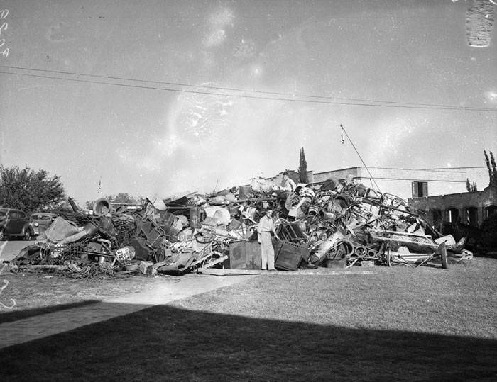#204 Scrap metal pile in front of Alamo Heights High School, 1942
