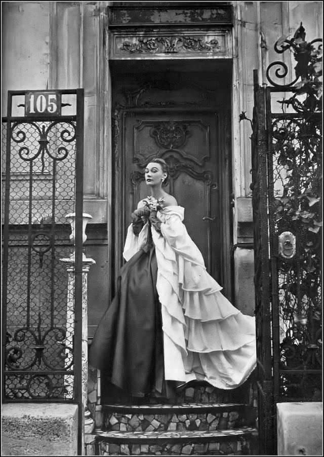 #16 Sophie Malgat in Givenchy’s evening gown with voluminous ruffled, tiered manteau, photo by Karen Radkai, Harper’s Bazaar, April 1952