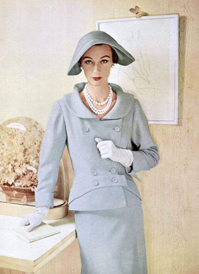 #36 Sophie Malgat in beautiful pale blue linen suit by Jean Patou, 1953