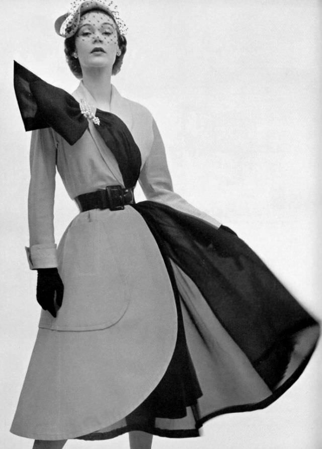#28 Sophie Malgat in beige alpaca coat dress over black organza skirt by Jacques Fath, 1951