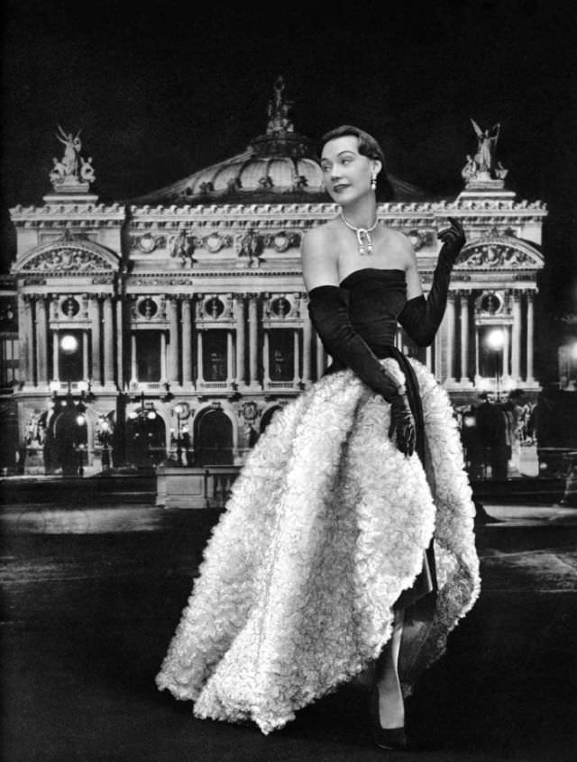 #29 Sophie Malgat in evening gown of black chiffon and white ruffled tulle embroidered with sequins by Cristobal Balenciaga, 1951