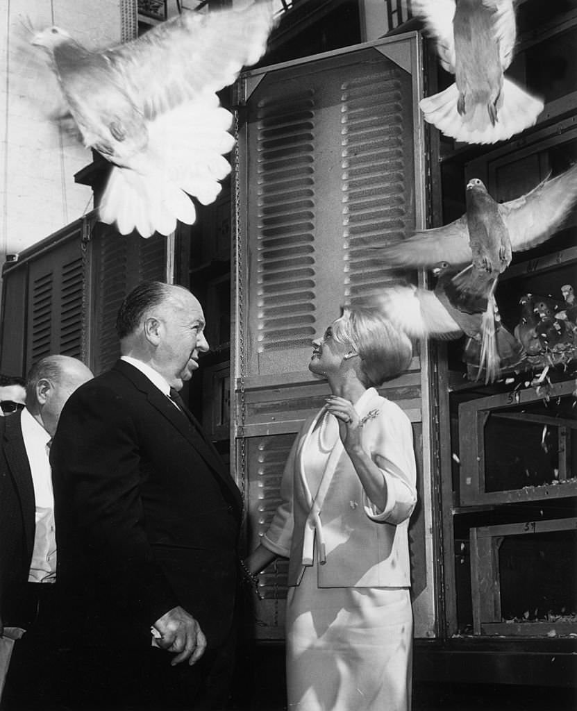 Tippi Hedren and Alfred Hitchcock release 1,000 pigeons at the RKO Palace Theater in New York City to mark the opening of Hitchcock’s film, ‘The Birds,’ 1963